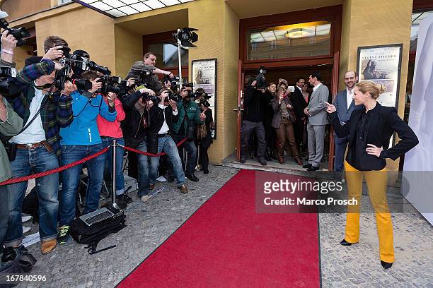 German singer Helene Fischer poses for photographers prior to the premiere of the documentary 'Allein im Licht' at the Babylon cinema on April 30,...