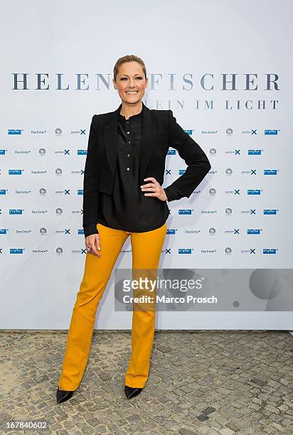 German singer Helene Fischer attends the premiere of the documentary 'Allein im Licht' at the Babylon cinema on April 30, 2013 in Berlin, Germany.