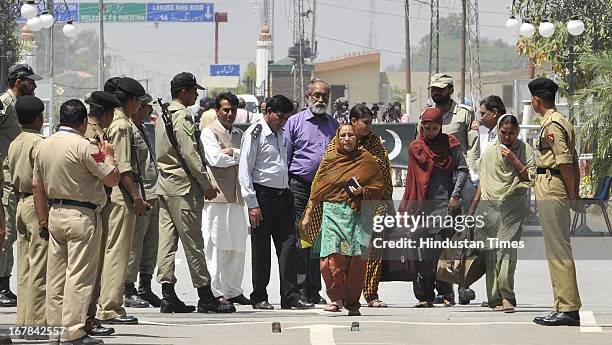 Indian prisoner in Pakistan Sarabjit Singh’s family, sister Dalbir Kaur, wife Sukhpreet Kaur and daughters Swapandeep and Poonam crossing border...