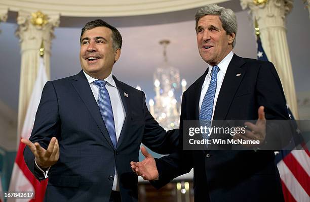 Secretary of State John Kerry and the President of Georgia Mikheil Saakashvili speak to journalists following a bilateral meeting at the U.S. State...