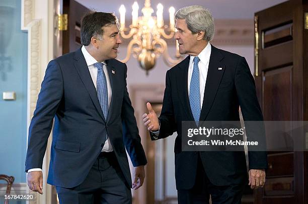 Secretary of State John Kerry and the President of Georgia Mikheil Saakashvili confer following a bilateral meeting at the U.S. State Department May...