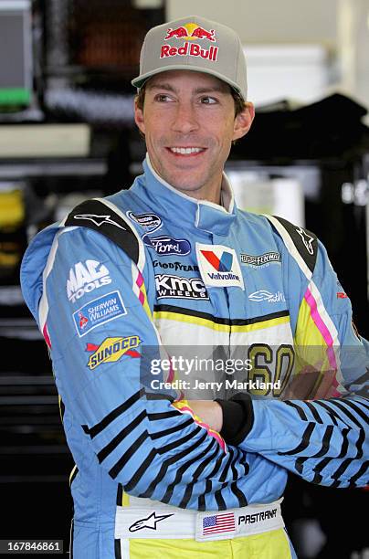 Travis Pastrana, driver of the Roush Fenway Racing Ford, stands in the garage during practice for the NASCAR Nationwide Series Sam's Town 300 at Las...