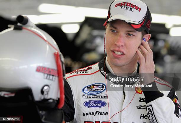 Brad Keselowski, driver of the Discount Tire Ford, stands in the garage during practice for the NASCAR Nationwide Series Sam's Town 300 at Las Vegas...