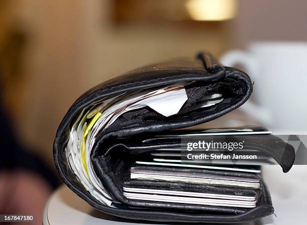 a stuffed wallet - full wallet stock pictures, royalty-free photos & images