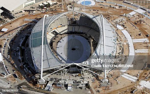 An aerial view taken 13 July 2004 shows the main Olympic stadium in Athens. Athens Olympics chief Gianna Angelopoulos-Daskalaki on Tuesday called on...