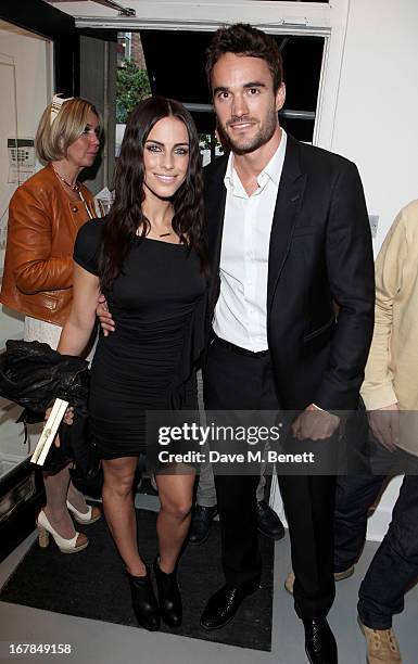 Jessica Lowndes and Thom Evans attend a private view of 'Human Relations' featuring the photographs of Fenton Bailey and Mairi-Luise Tabbakh, curated...