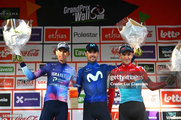 Dylan Teuns of Belgium and Team Israel - Premier Tech on second place, race winner Gonzalo Serrano of Spain and Movistar Team and Jasper De Buyst of...