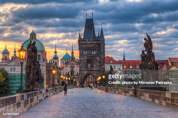 charles bridge morning - czech republic stock pictures, royalty-free photos & images