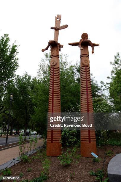 Rick Bartow's "We Were Always Here, 2012" sculptures, sits outside the National Museum of the American Indian, in Washington, D. C. On APRIL 19.