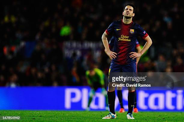 Cesc Fabregas of Barcelona reacts as his side concede their third goal during the UEFA Champions League semi final second leg match between Barcelona...