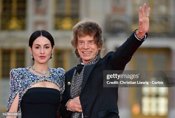 Melanie Hamrick and Mick Jagger arrive ahead of the state dinner at the Palace of Versailles on September 20, 2023 in Versailles, France. The King...