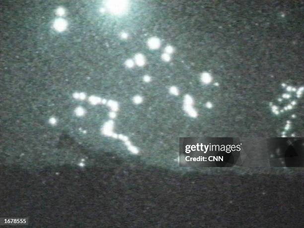 This image taken from a low-light video camera shows tracer-fire from antiaircraft guns January 16, 1991 in Baghdad, Iraq. The video was shot from...