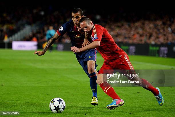 Franck Ribery of Munich Franck Ribery of Munich holds off Daniel Alves of Barcelona during the UEFA Champions League semi final second leg match...