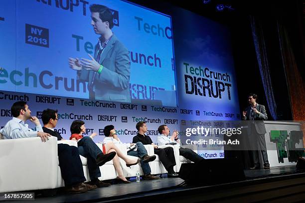 Judges Eric Eldon, David Lee, Nancy Peretsman, Chi-Hua Chien, Roelof Botha and Michael Arrington watch Floored present onstage at TechCrunch Disrupt...