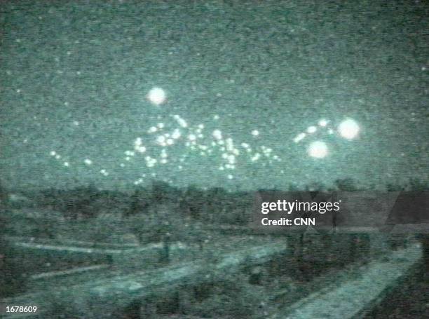 This image taken from a low-light video camera shows tracer-fire from antiaircraft guns on February 22, 1991 in Baghdad, Iraq. The video was shot...