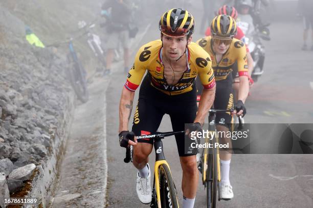 Primoz Roglic of Slovenia, Jonas Vingegaard of Denmark and Sepp Kuss of The United States and Team Jumbo-Visma - Red Leader Jersey compete in the...