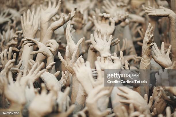 the hands of hell - sea of hands stock pictures, royalty-free photos & images