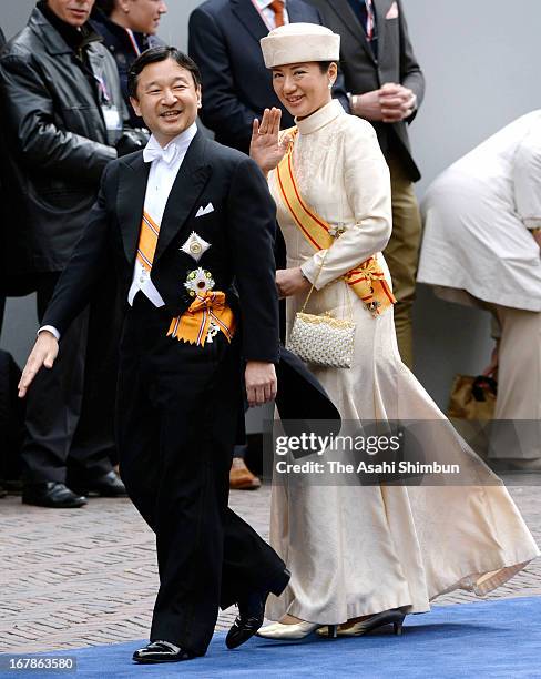 Crown Prince Naruhito, and Crown Princess Masako of Japan leave the Nieuwe Kerk in Amsterdam after the inauguration ceremony of King Willem Alexander...