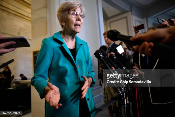 Sen. Elizabeth Warren talks to reporters following the closed-door "AI Insight Forum" outside the Kennedy Caucus Room in the Russell Senate Office...