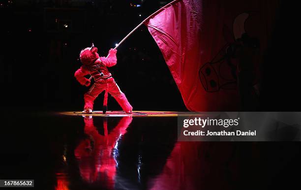 Benny, the mascot of the Chicago Bulls, waves a flag during player introductions before the Bulls take on the Brooklyn Nets in Game Three of the...