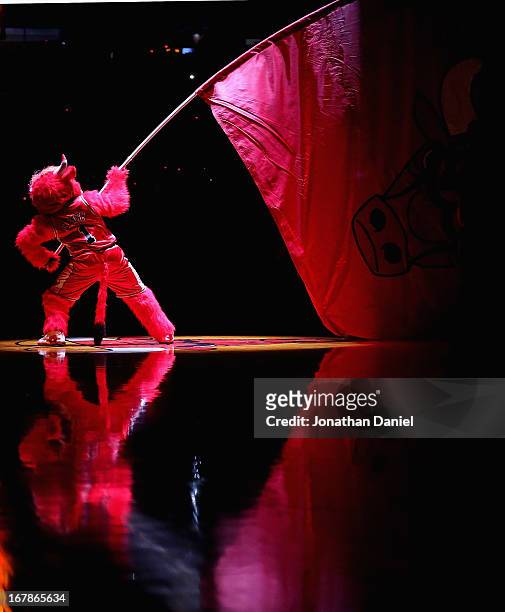 Benny, the mascot of the Chicago Bulls, waves a flag during player introductions before the Bulls take on the Brooklyn Nets in Game Three of the...