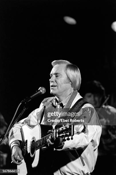 George Jones performs on stage at Tramps in New York City on 12th November 1992.