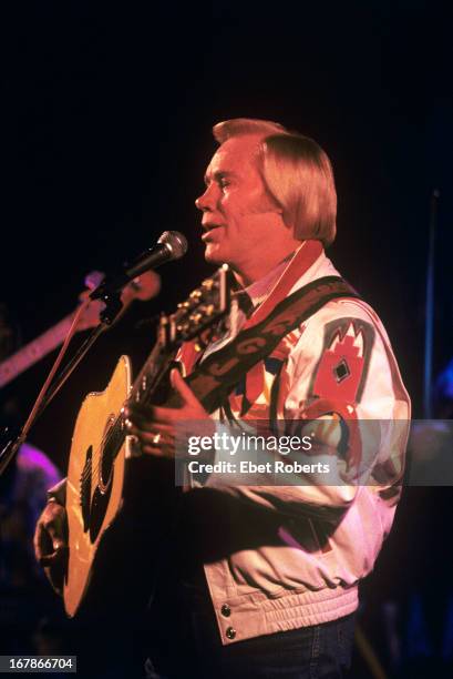 George Jones performs on stage at Tramps in New York City on 12th November 1992.