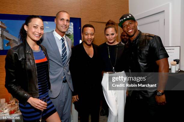 Cristen Barker, Nigel Barker, Chrissy Teigen John Legend, and Victor Cruz attend as Delta Air Lines celebrate the opening night of T4X, a pop up...