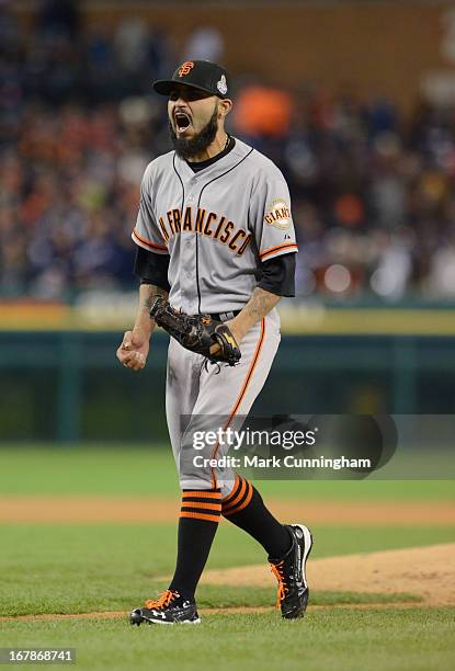 Sergio Romo of the San Francisco Giants reacts to getting the final out of Game Three of the World Series against the Detroit Tigers at Comerica Park...