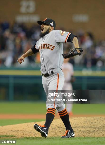 Sergio Romo of the San Francisco Giants reacts to getting the final out of Game Three of the World Series against the Detroit Tigers at Comerica Park...