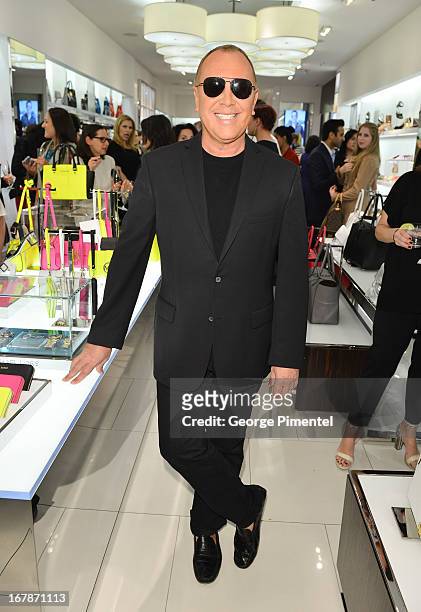 Fashion Designer Michael Kors Join Top Clients at Michael Kors Canadian Flagship Store on May 1, 2013 in Toronto, Canada.