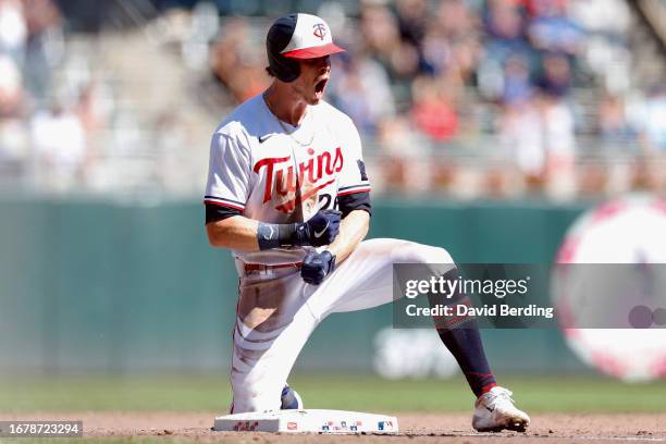 Max Kepler of the Minnesota Twins celebrates his two-run triple against the Tampa Bay Rays in the fifth inning at Target Field on September 13, 2023...