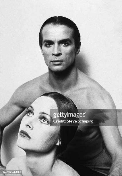 Portrait of Russian-born dancer & actor Rudolf Nureyev (1938 - 1993 and American singer & actress Michelle Phillips during the filming of 'Valentino'...