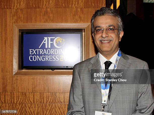 Sheikh Salman Bin Ebrahim Al Khalifa of Bahrain poses after he was elected as the 11th President of the Asian Football Confederation during the 2013...