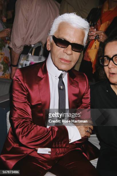 German fashion designer, artist and photographer Karl Lagerfeld at the Art Basel party being held at the Mynt Lounge, Miami, 2002..