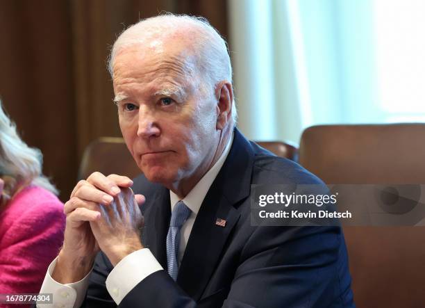 President Joe Biden listens to shouted questions regarding impeachment during a meeting of his Cancer Cabinet at the White House on September 13,...