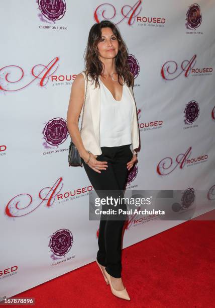Actress Gina Gershon attends the Los Angeles premiere of "Aroused" at the Landmark Theater on May 1, 2013 in Los Angeles, California.