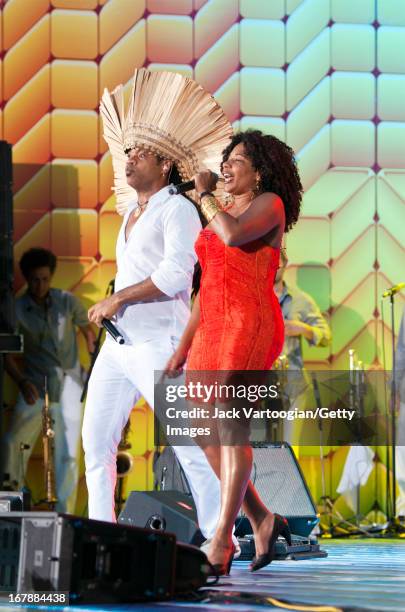 Brazilian musician Carlinhos Brown performs with singer Margareth Menezes during the 26th Annual Brazilian Day Festival on a stage on W. 44th Street...