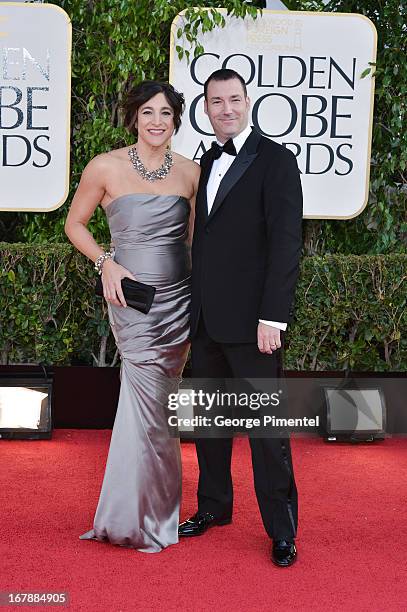 Director Mark Andrews and guest arrive at the 70th Annual Golden Globe Awards held at The Beverly Hilton Hotel on January 13, 2013 in Beverly Hills,...