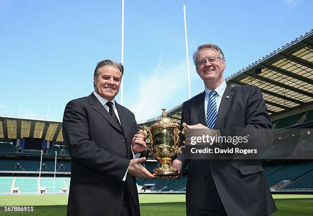 Bernard Lapasset, RWCL Chairman, holds the Webb Ellis Cup with Brett Gosper, the IRB Chief Executive during the IRB Rugby World Cup 2015 Schedule...