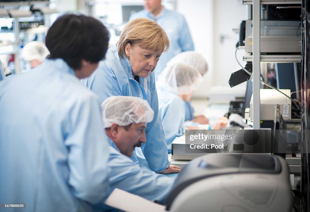 Merkel Visits Jena Optronik Factory