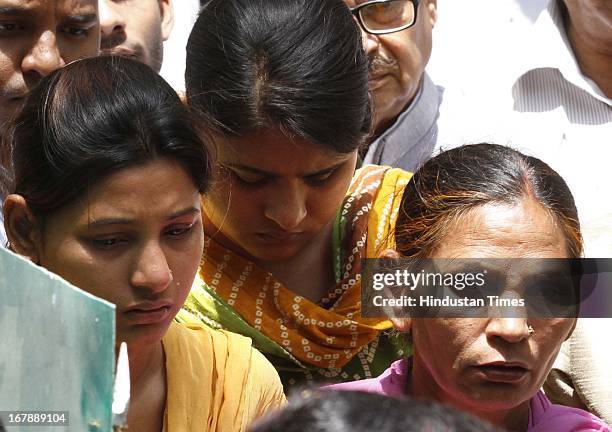 Sukhpreet Kaur, wife and daughters Swapandeep and Poonam of Sarabjit Singh an Indian prisoner in Pakistan who died in Pakistan hospital after being...