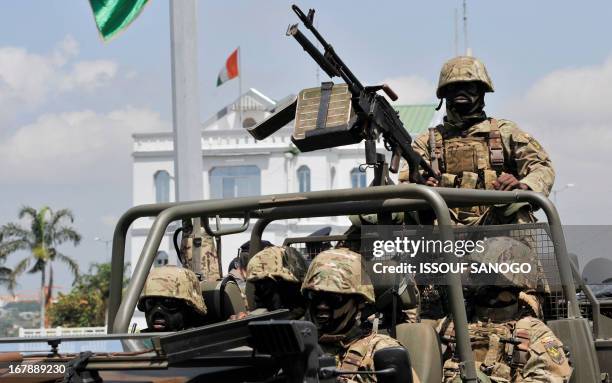 Ivory Coast Republican Forces soldiers of the logistics battalion, part of the African-led International Support Mission to Mali leave Ivory Coast's...