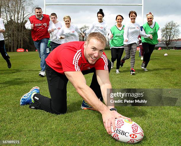 Ulster's Stephen Ferris coaches young people from the The Prince's Trust Fairbridge programme during an HSBC rugby event in the build-up to the 2013...