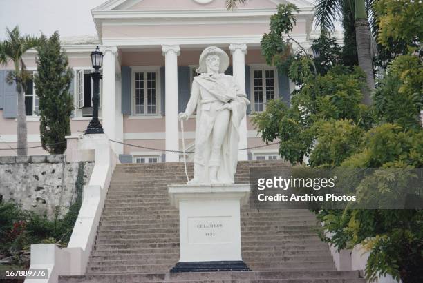 Statue of Christopher Columbus stands on the front steps of Government House in Nassau, Bahamas, circa 1968. This is the official residence of the...