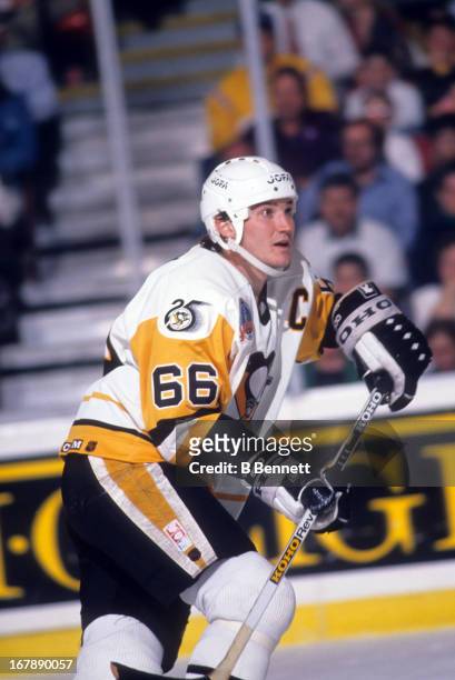 Mario Lemieux of the Pittsburgh Penguins skates on the ice during Game 1 of the 1992 Stanley Cup Finals against the Chicago Blackhawks on May 26,...