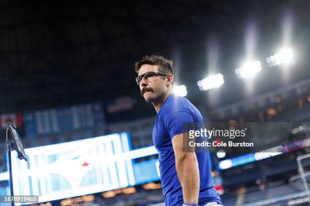 Davis Schneider of the Toronto Blue Jays warms up ahead of their MLB game against the Washington Nationals at Rogers Centre on August 29, 2023 in...