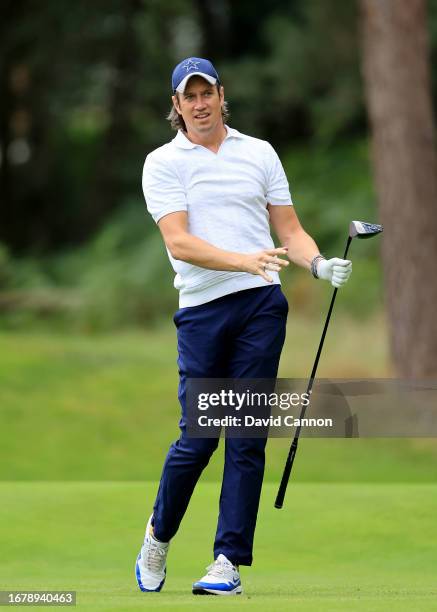 Vernon Kay of England the BBC Strictly Come Dancing dancer and judge plays a shot during the pro-am prior to the BMW PGA Championship at Wentworth...