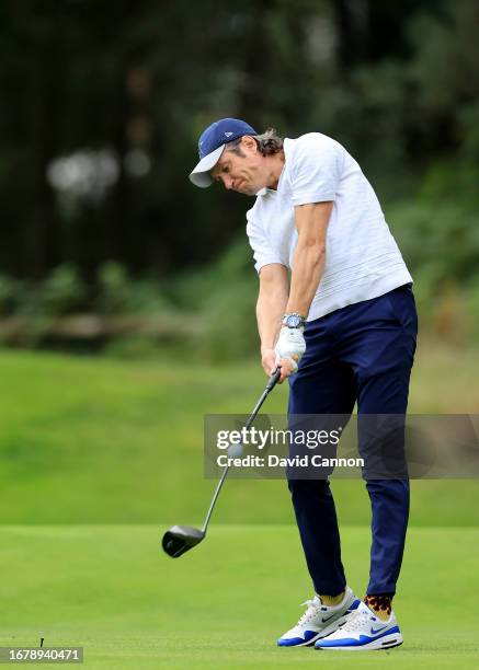 Vernon Kay of England the BBC Strictly Come Dancing dancer and judge plays a shot during the pro-am prior to the BMW PGA Championship at Wentworth...