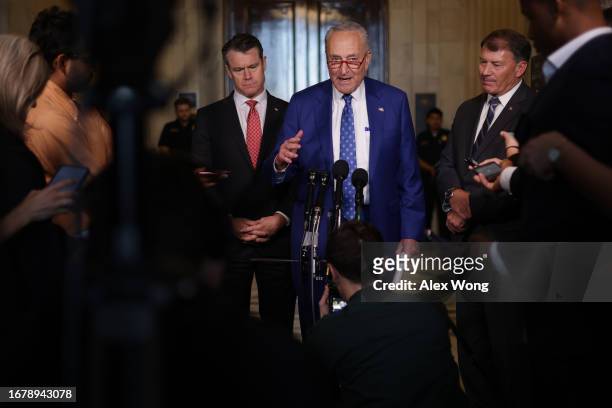 Senate Majority Leader Sen. Chuck Schumer speaks to members of the press as Sen. Todd Young and Sen. Michael Rounds listen outside the “AI Insight...